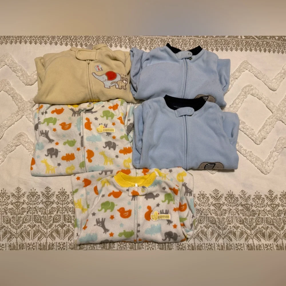 Set of five baby fleece sleep sacks size 0- 9 months